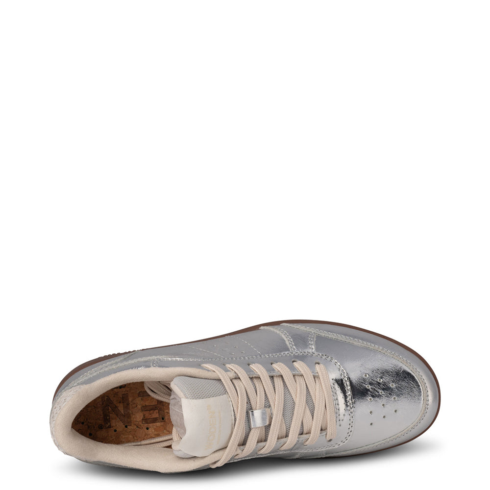 Woden Bjork. Sustainably made women's silver leather casual sneakers.