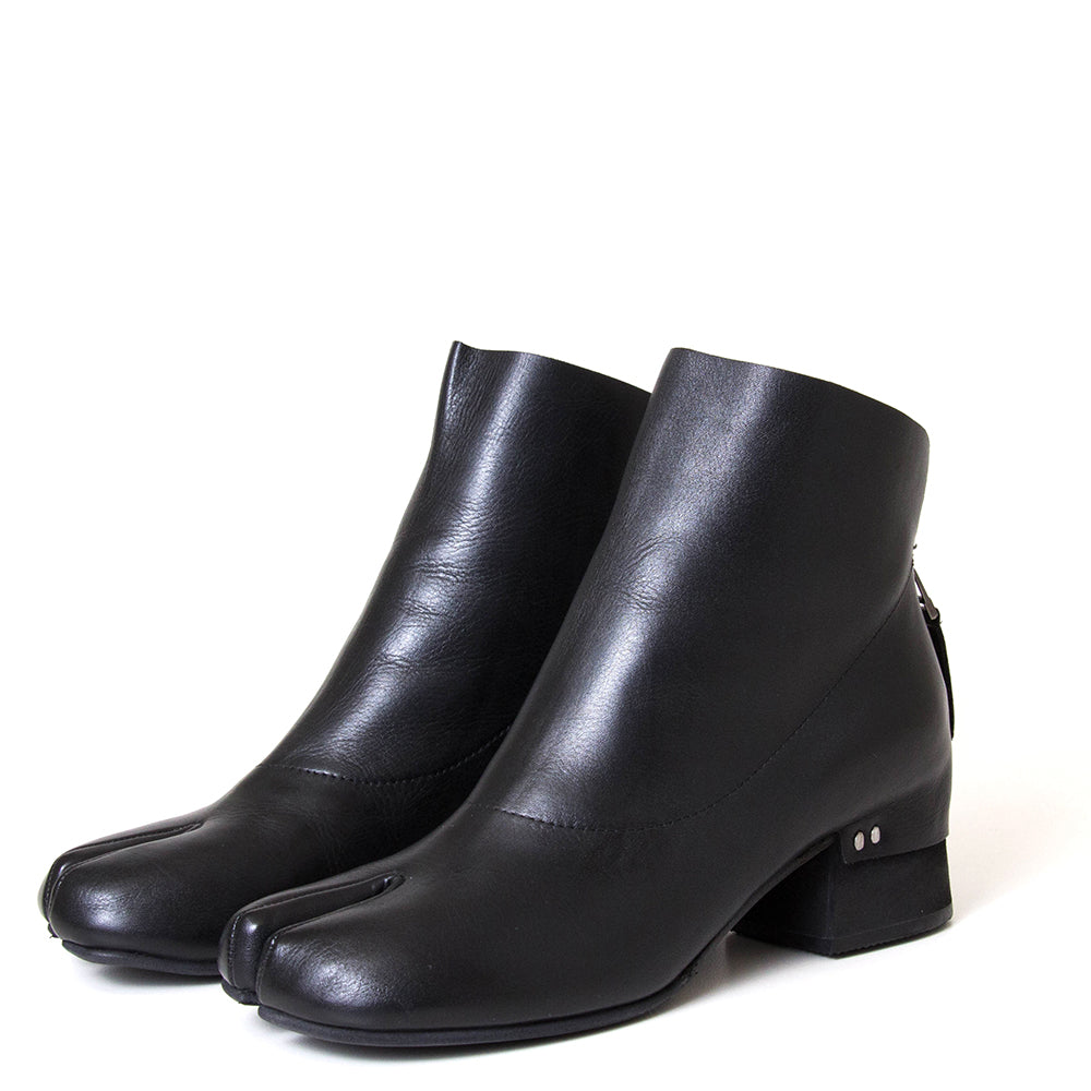 yuko imanishi + 737038-1 Haku. Women's 1¾" heel split toe leather ankle boot.