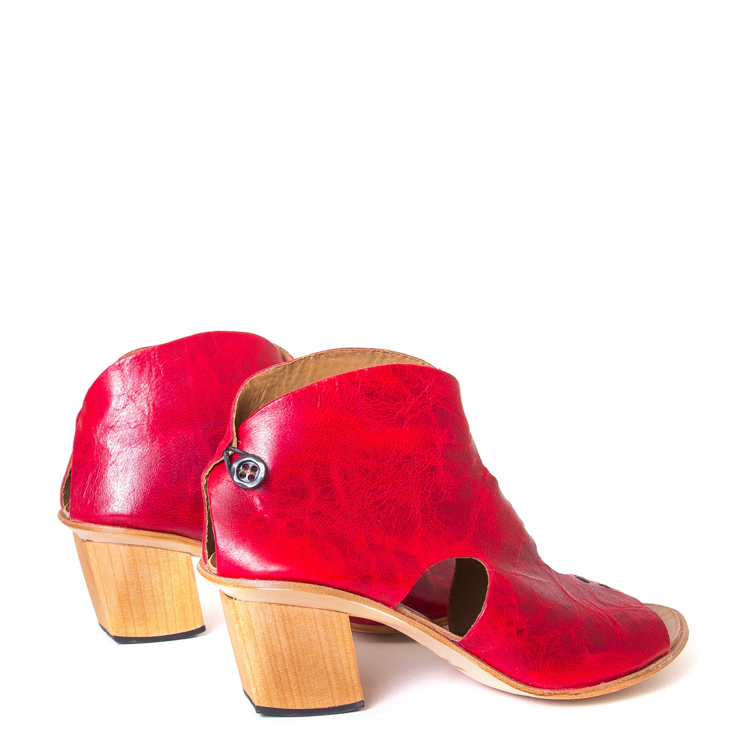 Cydwoq Research Women's sandal in Red washed leather, 2.5 inch wooden Heel, open toe, made in California. Back view, pair.