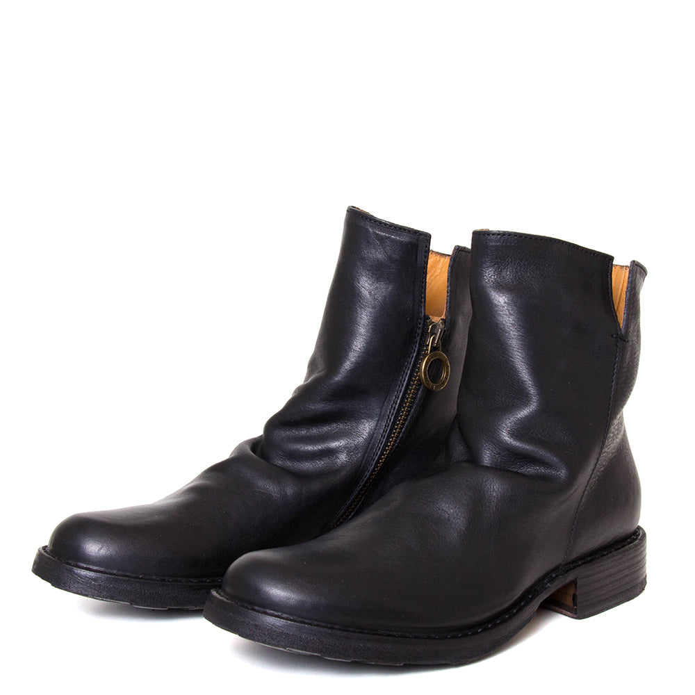 Fiorentini + Baker Elf. Women's side zip boot in black Italian leather. 1⅛-inch heel made in Italy. 3/4 view.