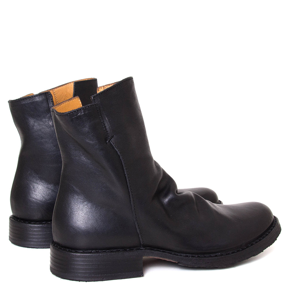 Fiorentini + Baker Elf. Women's side zip boot in black Italian leather. 1⅛-inch heel made in Italy. Back view.