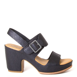 Kork-Ease San Carlos. Women's leather sandals in Black. Side buckle, cushioned leather footbed, and a 3 ½ inch platform, 2.5 inch heel. Side view.