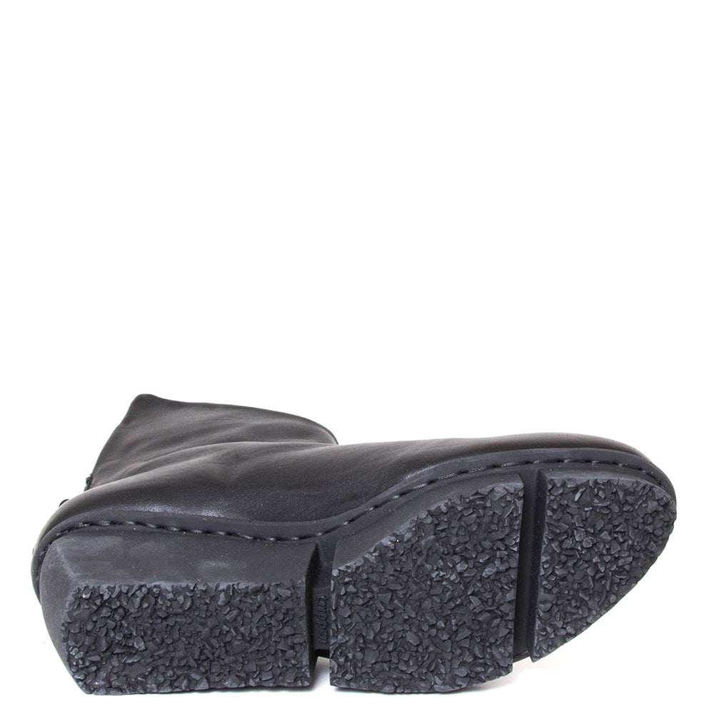 Trippen Hover. Women's platform wedge ankle boot in black leather. Made in Germany. Sole view.