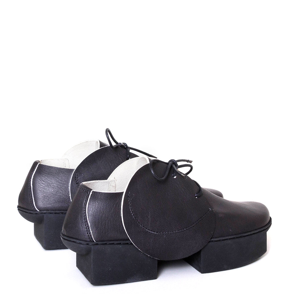 Trippen Specular. Women's leather platform shoe in black leather. Made in Germany. Back pair view.