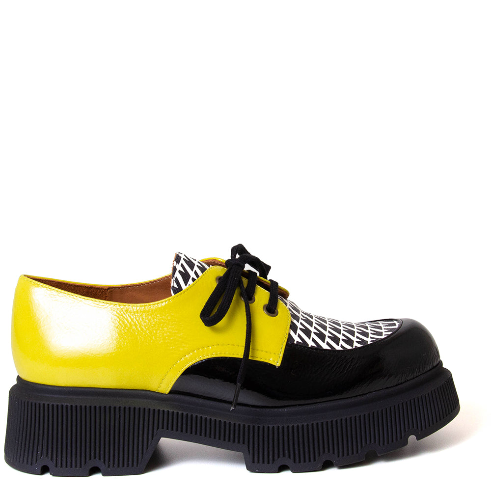 Chie Mihara Qamba. Women's platfom yellow, black and white leather. Made in Spain.