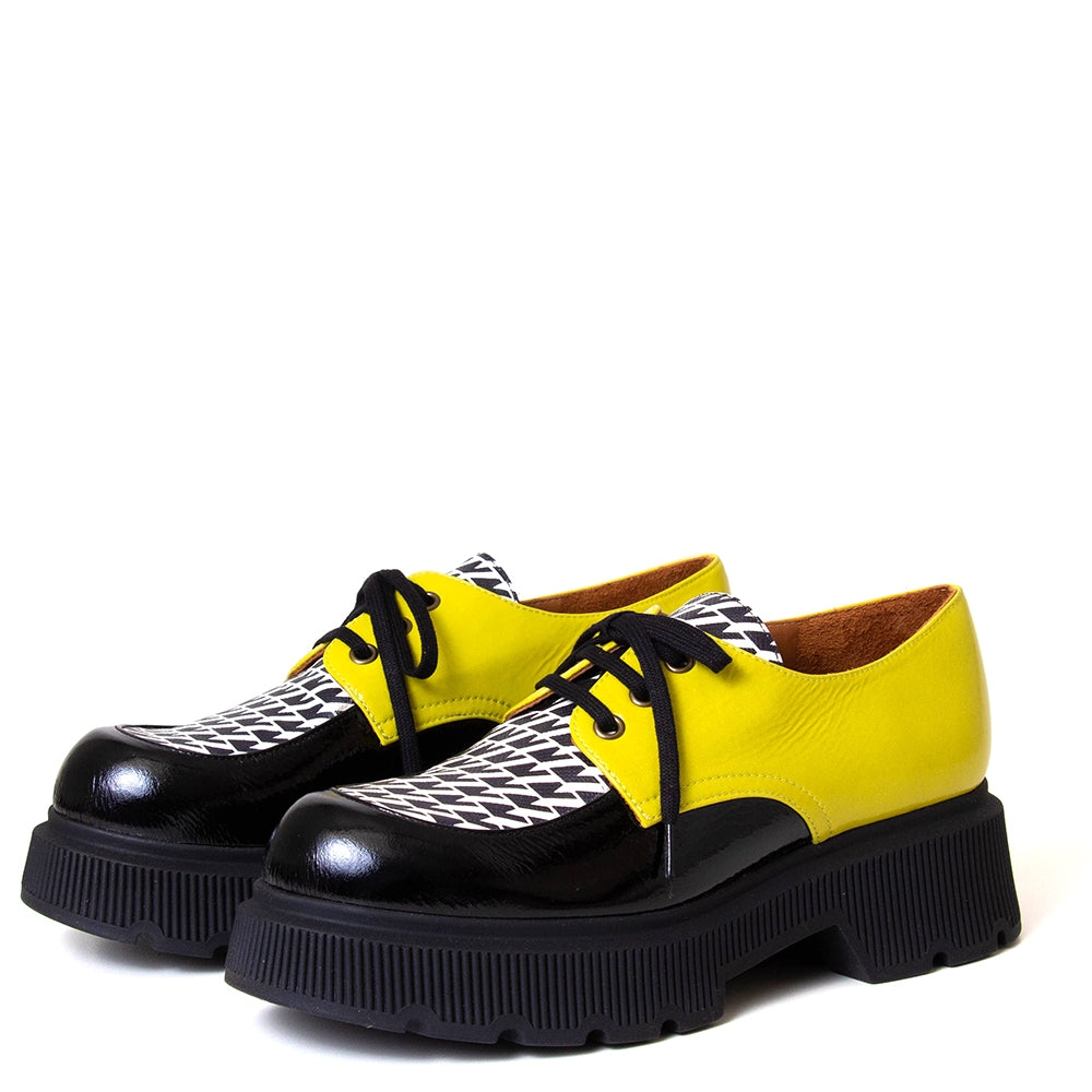 Chie Mihara Qamba. Women's platfom yellow, black and white leather. Made in Spain.