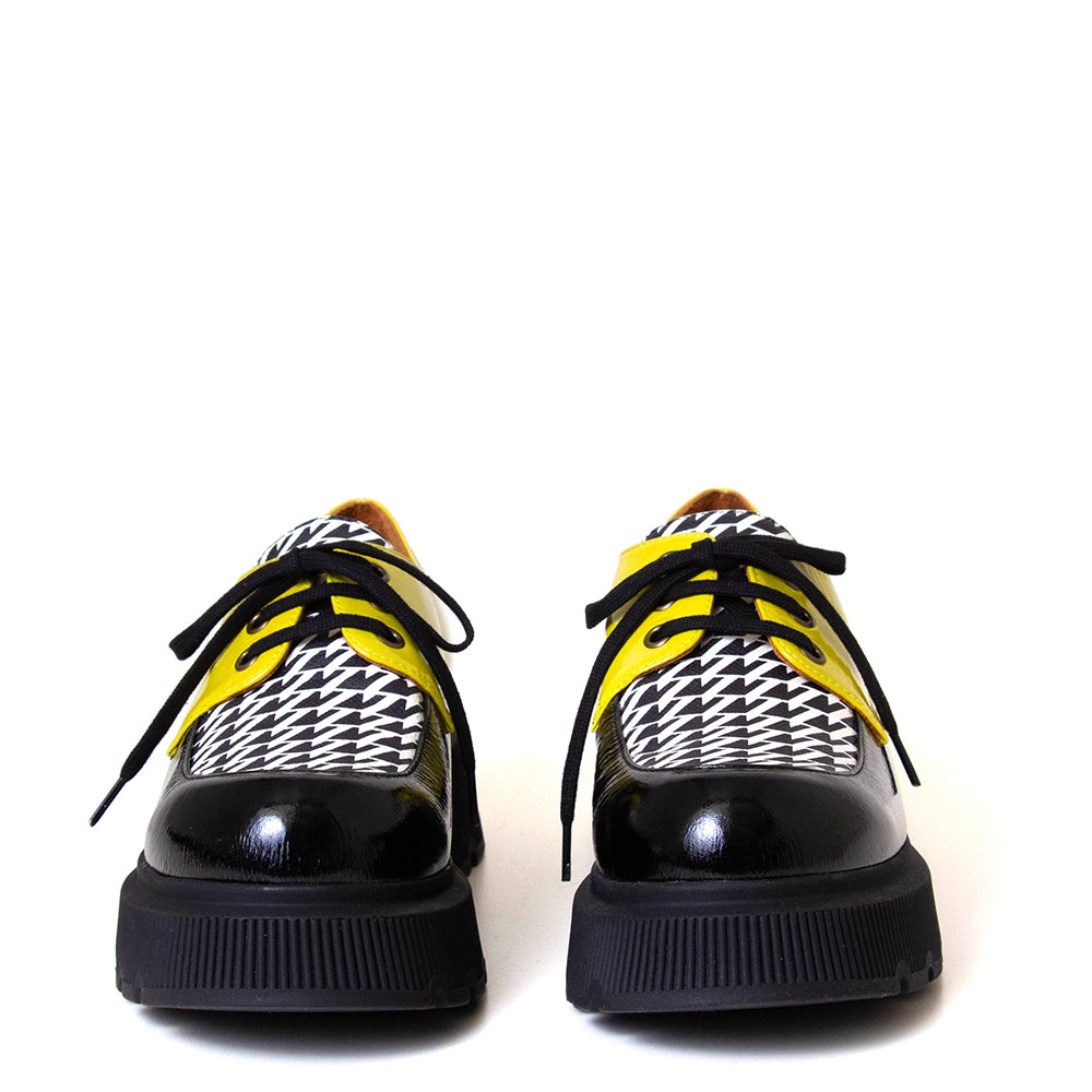 Chie Mihara Qamba. Women's platfom yellow, black and white leather. Made in Spain.