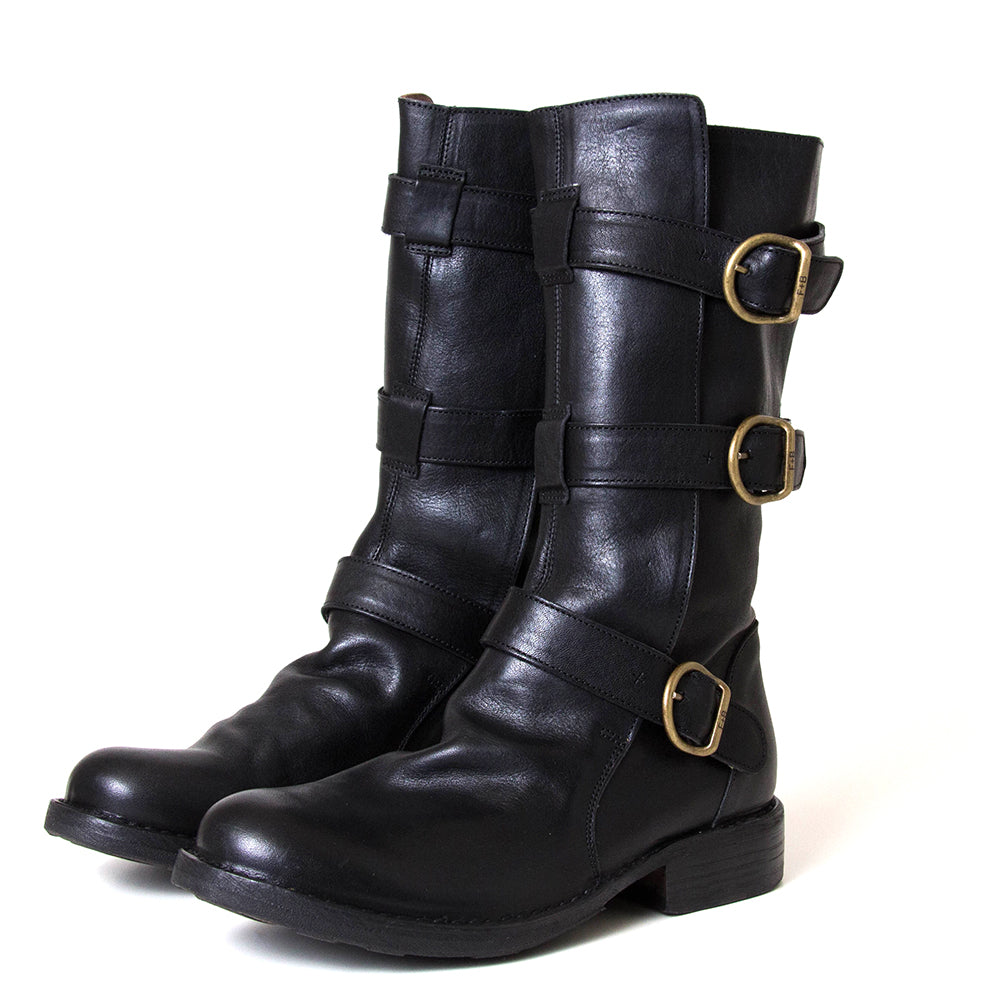 Black leather boots with gold buckles on a white background