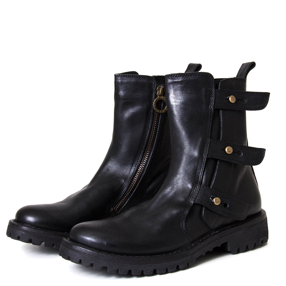 Fiorentini + Baker Erna. Women's black leather boot with brass rivets.