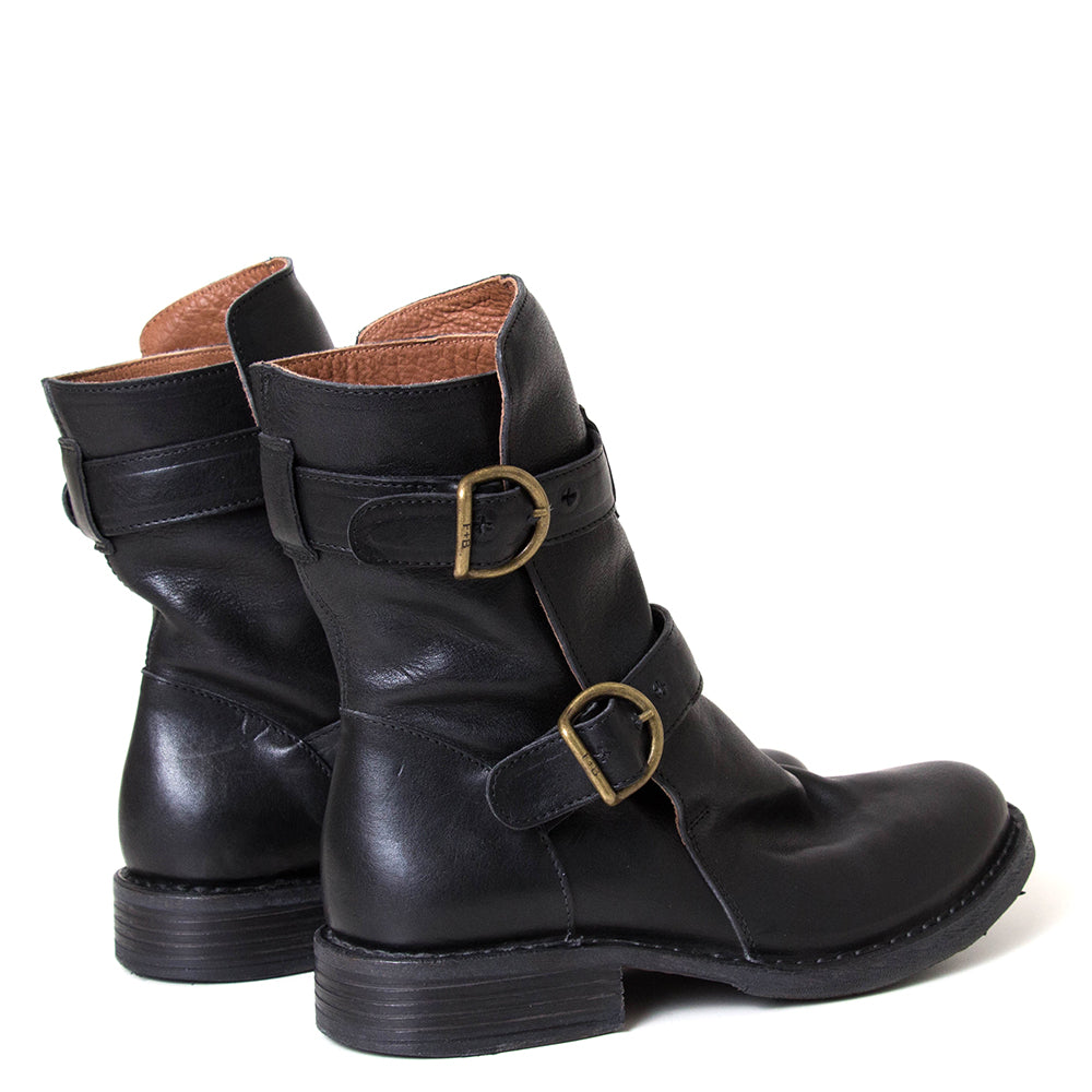 Fiorentini + Baker Eternity 713. Women's black leather boot with brass buckle.