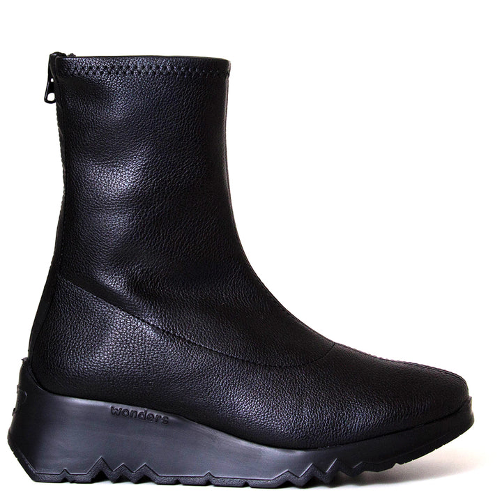 Wonders E-6732. Women's black leather platform wedge boot.  Side view.