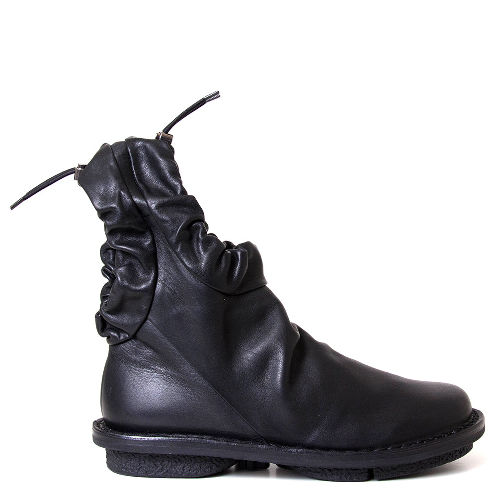 Trippen Resistor. Women's flat sole black leather ankle boot.