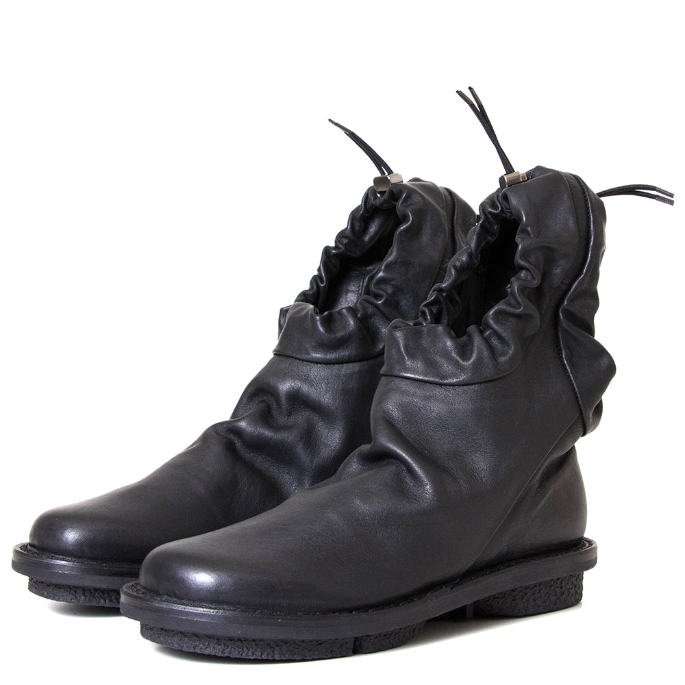 Trippen Resistor. Women's flat sole black leather ankle boot.