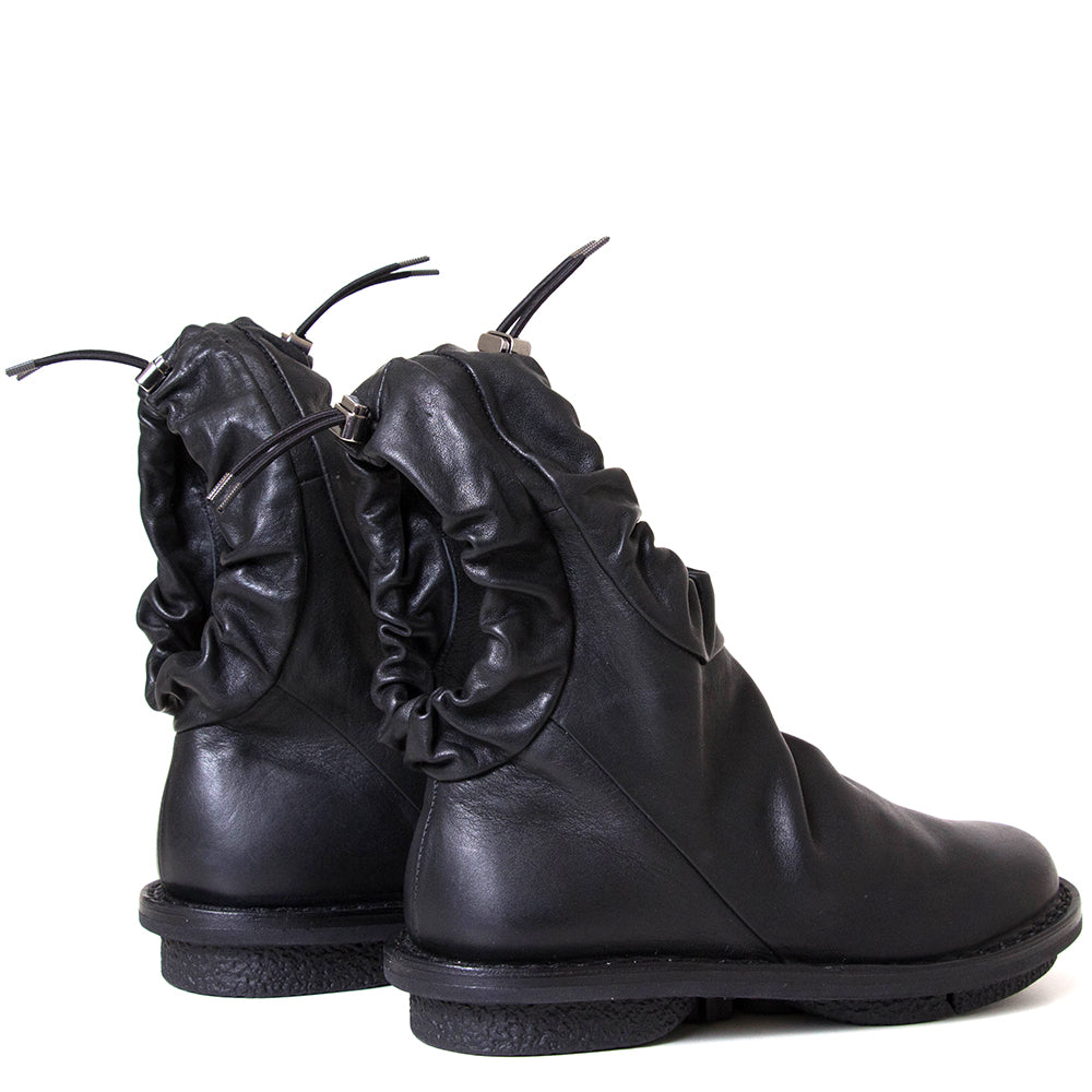 Trippen Resistor. Women's flat sole black leather ankle boot.