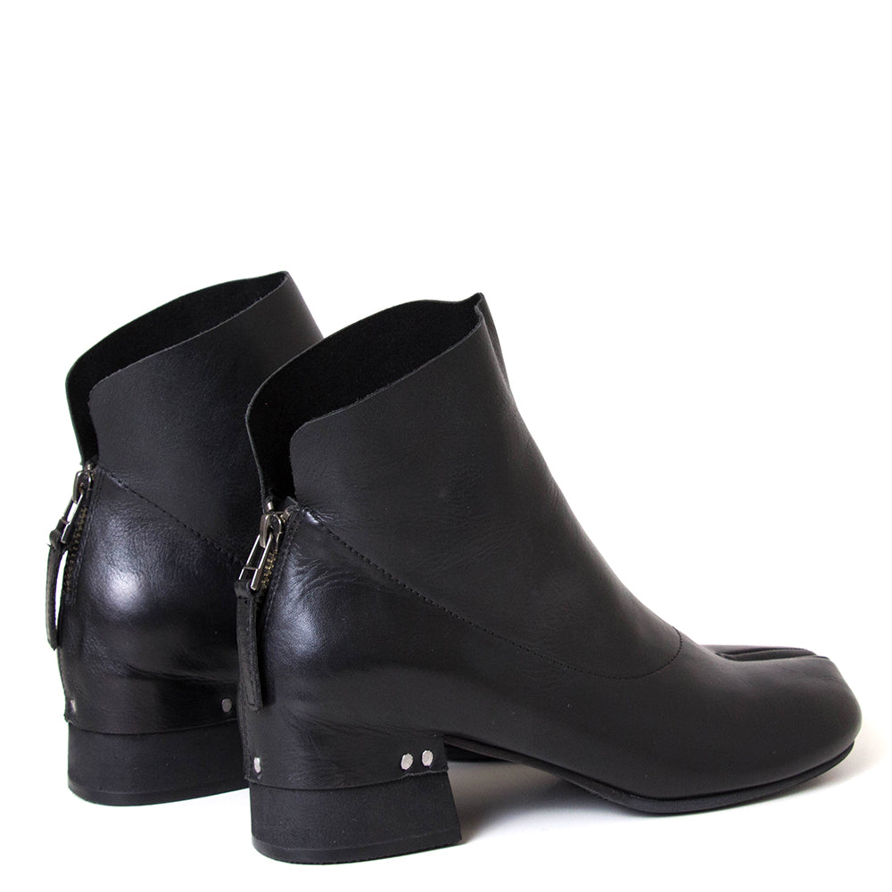 yuko imanishi + 737038-1 Haku. Women's 1¾" heel split toe leather ankle boot. 