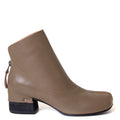 yuko imanishi + 737038-1 Haku. Women's 1¾" heel split toe leather ankle boot. 