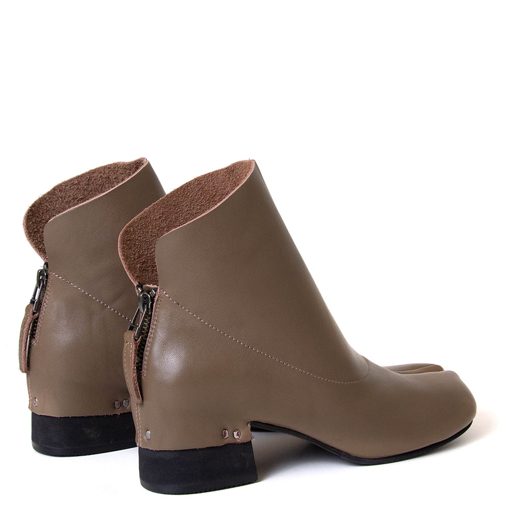 yuko imanishi + 737038-1 Haku. Women's 1¾" heel split toe leather ankle boot. 