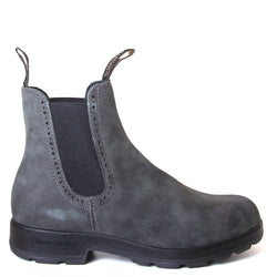 Blundstone Women's 1630 Chelsea Boot  in Rustic Black. Built to last. Perfect of everyday wear. Durable material, with comfortable shock absorption insole. Rubber sole. Side view. 