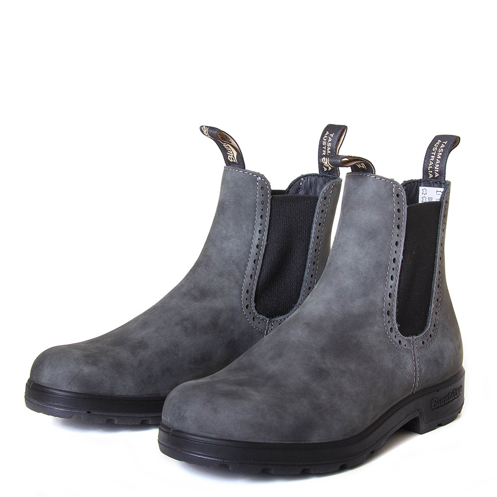 Blundstone Women's 1630 Chelsea Boot in Rustic Black. Built to last. Perfect of everyday wear. Durable material, with comfortable shock absorption insole. Rubber sole. Front view, pair.