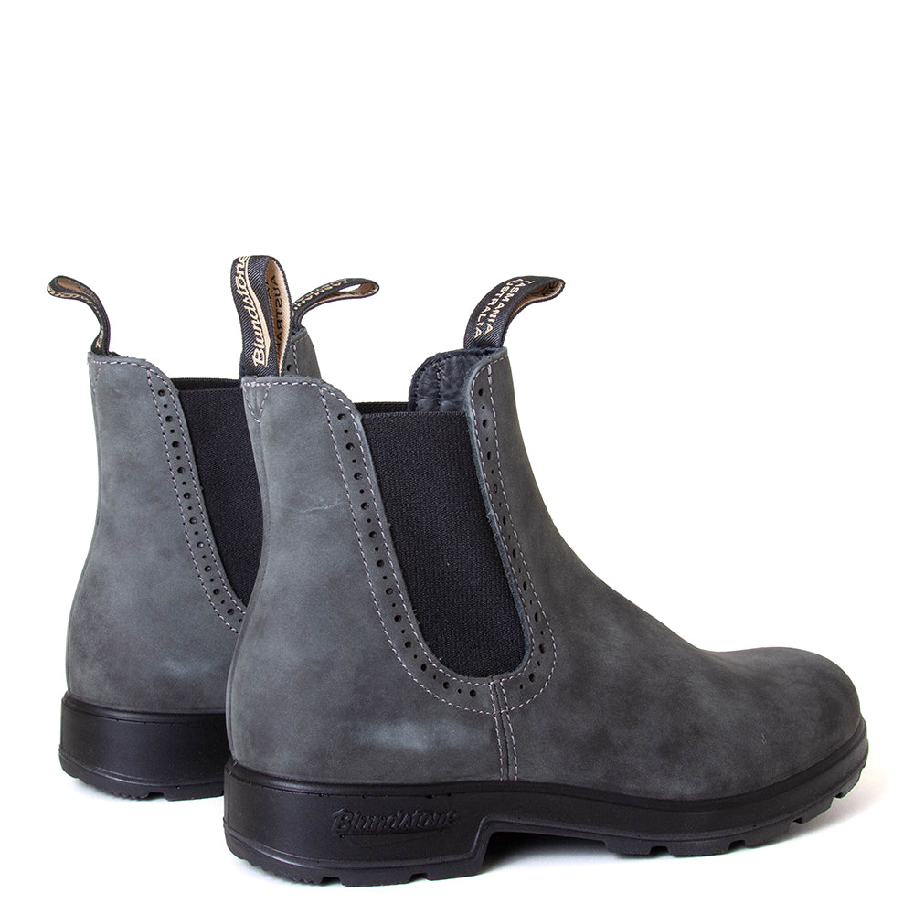 Blundstone Women's 1630 Chelsea Boot in Rustic Black. Built to last. Perfect of everyday wear. Durable material, with comfortable shock absorption insole. Rubber sole. Back view, pair.