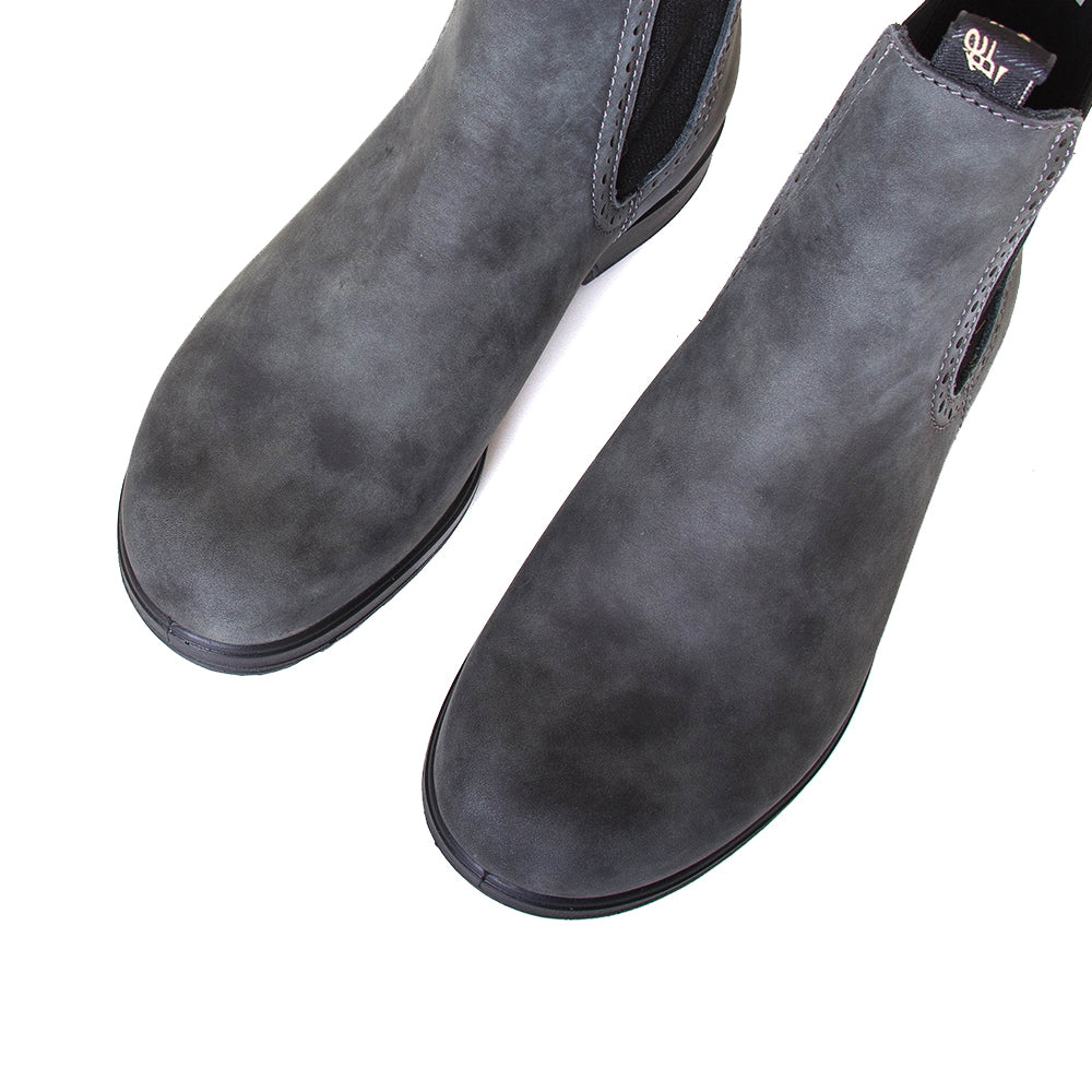 Blundstone Women's 1630 Chelsea Boot in Rustic Black. Built to last. Perfect of everyday wear. Durable material, with comfortable shock absorption insole. Rubber sole. Top view, pair.