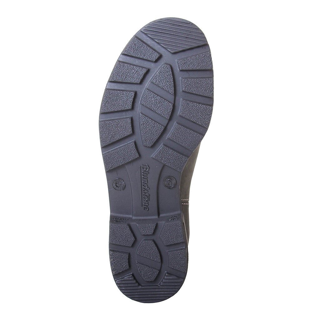 Blundstone Women's 1630 Chelsea Boot in Rustic Black. Built to last. Perfect of everyday wear. Durable material, with comfortable shock absorption insole. Rubber sole. Bottom view.