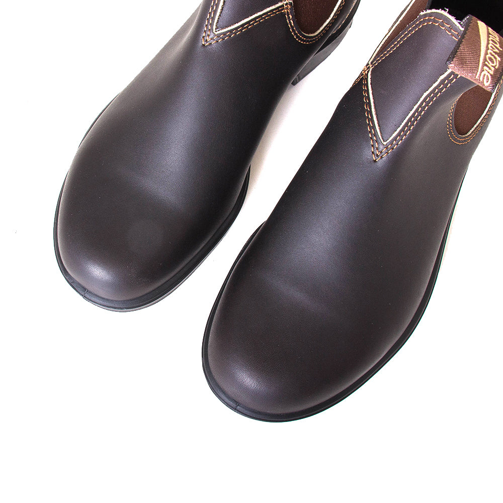 Blundstone Women's 500 Chelsea Boot in Black. Built to last. Durable material, with comfortable shock absorption insole. Rubber sole. Top pair view.