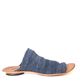 Cydwoq Asia. Women's mules in denim blue leather. Made in CA with sculpted leather soles that mold to the foot for comfort with an embedded metal shank for excellent arch support. Side view.