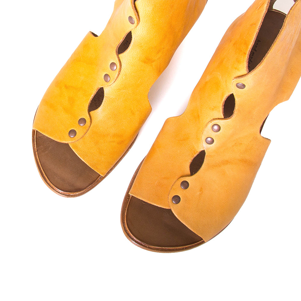 Cydwoq Research Women's sandal in yellow washed leather, 2.5 inch wooden Heel, open toe, made in California. Pair above view.