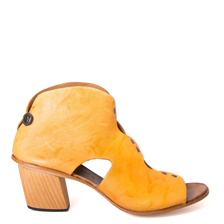 Cydwoq Research Women's sandal in yellow washed leather, 2.5 inch wooden Heel, open toe, made in California. Side view.