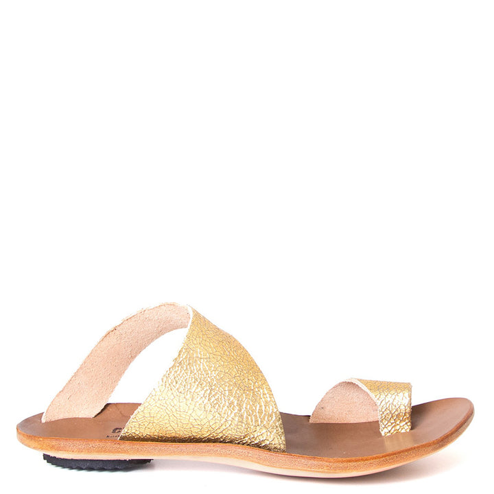 Cydwoq Thong , Hillary Sandal gold leather, single strap and toe ring. Made in California. Side view.