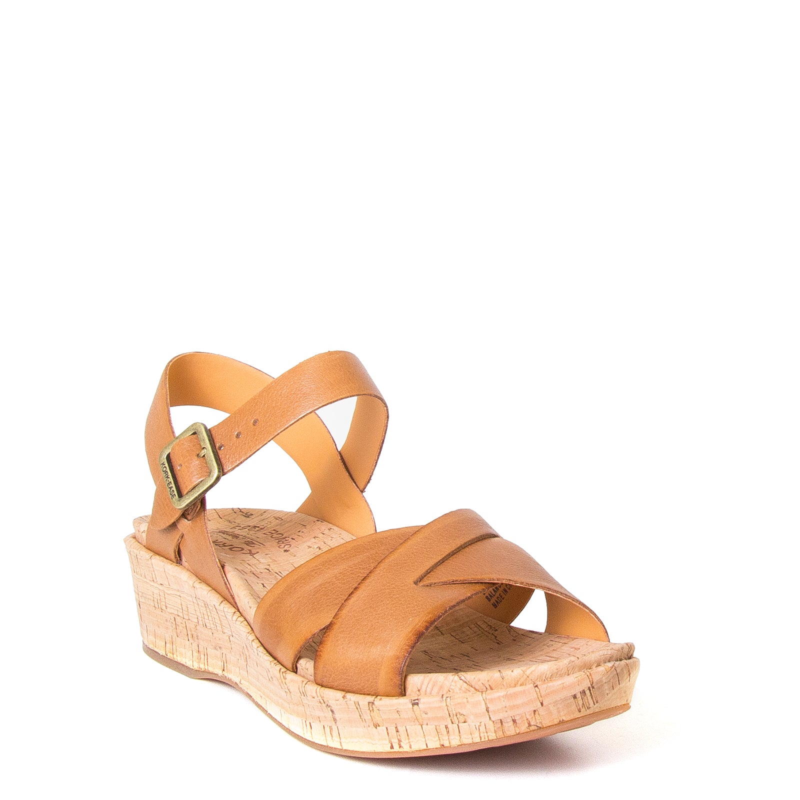 Myrna 2.0, by Kork-Ease®. Women's Leather Sandals in Brown, slingback, with side Buckle, wide crossed straps. Cushioned anatomical cork footbed for comfort and Style. Imported. 2" heel, 1" platform. Front view.