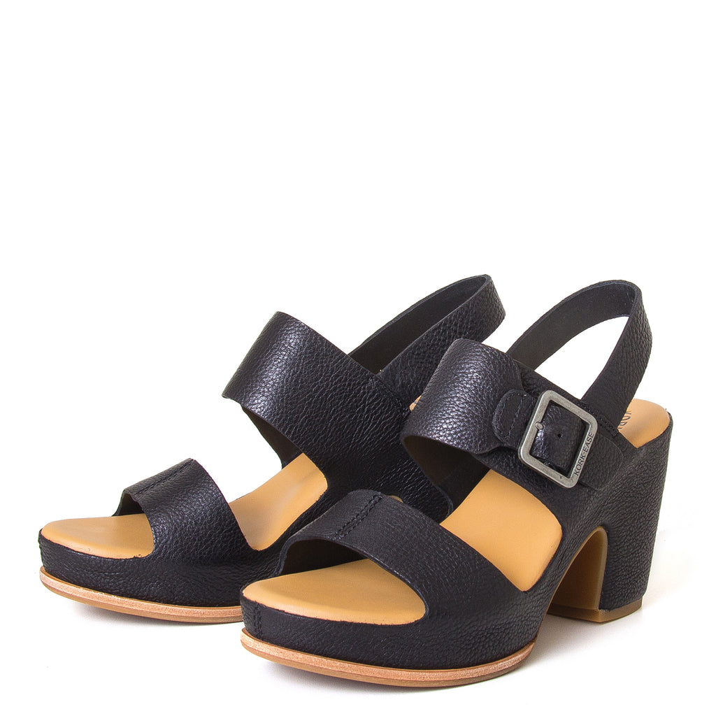 Kork-Ease San Carlos. Women's leather sandals in Black. Side buckle, cushioned leather footbed, and a 3 ½ inch platform, 2.5 inch heel. Front view, pair.