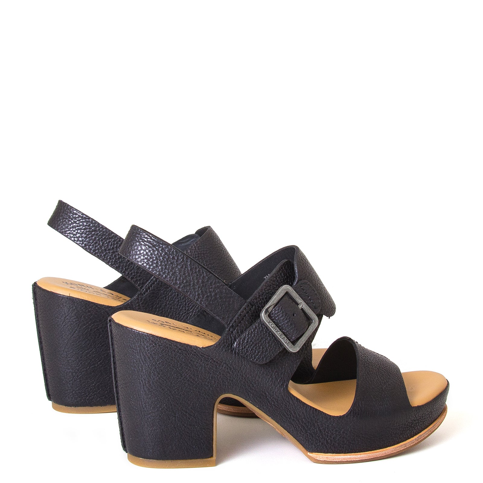 Kork-Ease San Carlos. Women's leather sandals in Black. Side buckle, cushioned leather footbed, and a 3 ½ inch platform, 2.5 inch heel. Back view, pair.