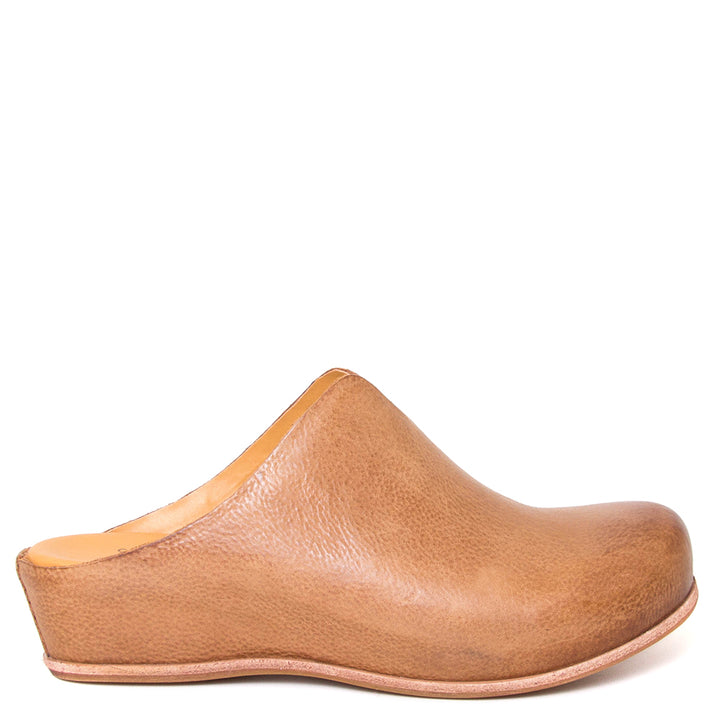 Kork-Ease Para. Women's wedge mule in brown terra leather. Heel Height: 1 1/2 Inches and Wedge Height: 1/2 Inch Side view.