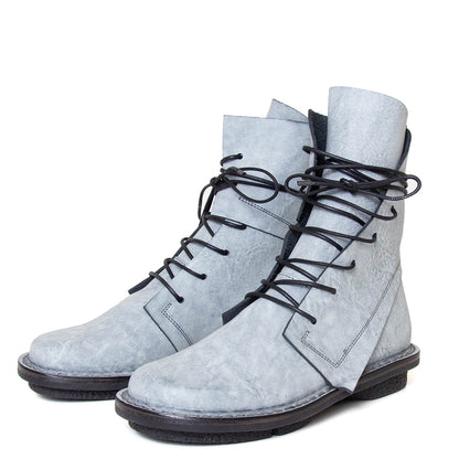 Trippen Vacate. Women's platform combat ankle boot in light blue leather. Made in Germany. 3/4 view.