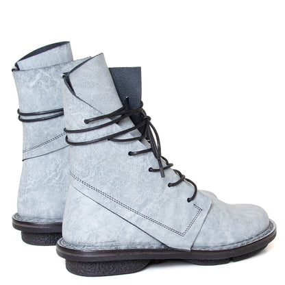 Trippen Vacate. Women's platform combat ankle boot in light blue leather. Made in Germany. Back view.