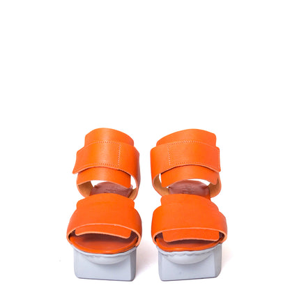 Trippen Visor. Women's platform sandal in orange leather & white sole. Made in Germany. Front pair view.