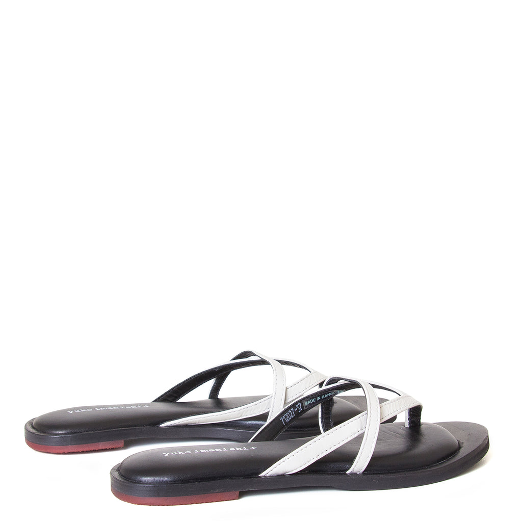 yuko imanishi + Alina. Women's sandals in Off-White patent leather, memory foam footbed for comfort. Flat heel. Back view, pair.