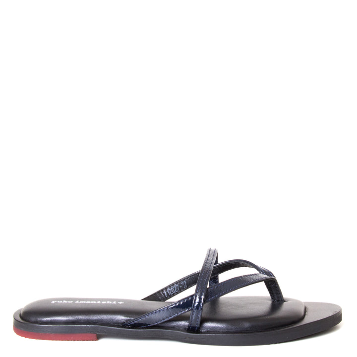 yuko imanishi + Alina. Women's sandals in Navy patent leather, memory foam footbed for comfort. Flat heel. Side view.